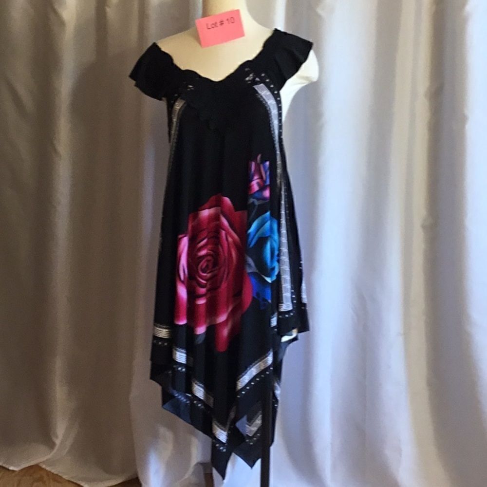 Sleeveless silk blend dress with a gypsy hem in size medium